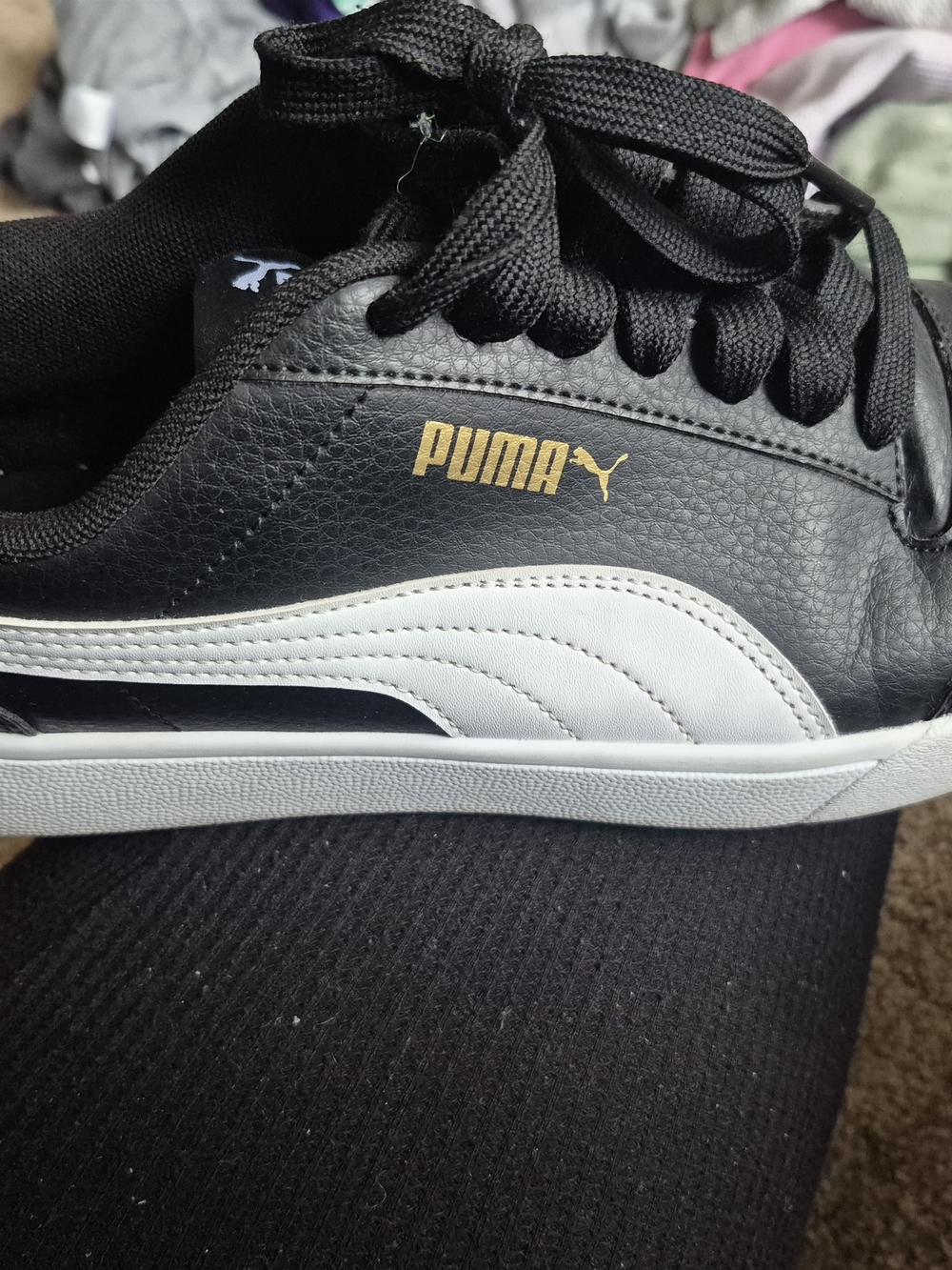 Puma Black and White Low-Top Sneakers with Gold Logo